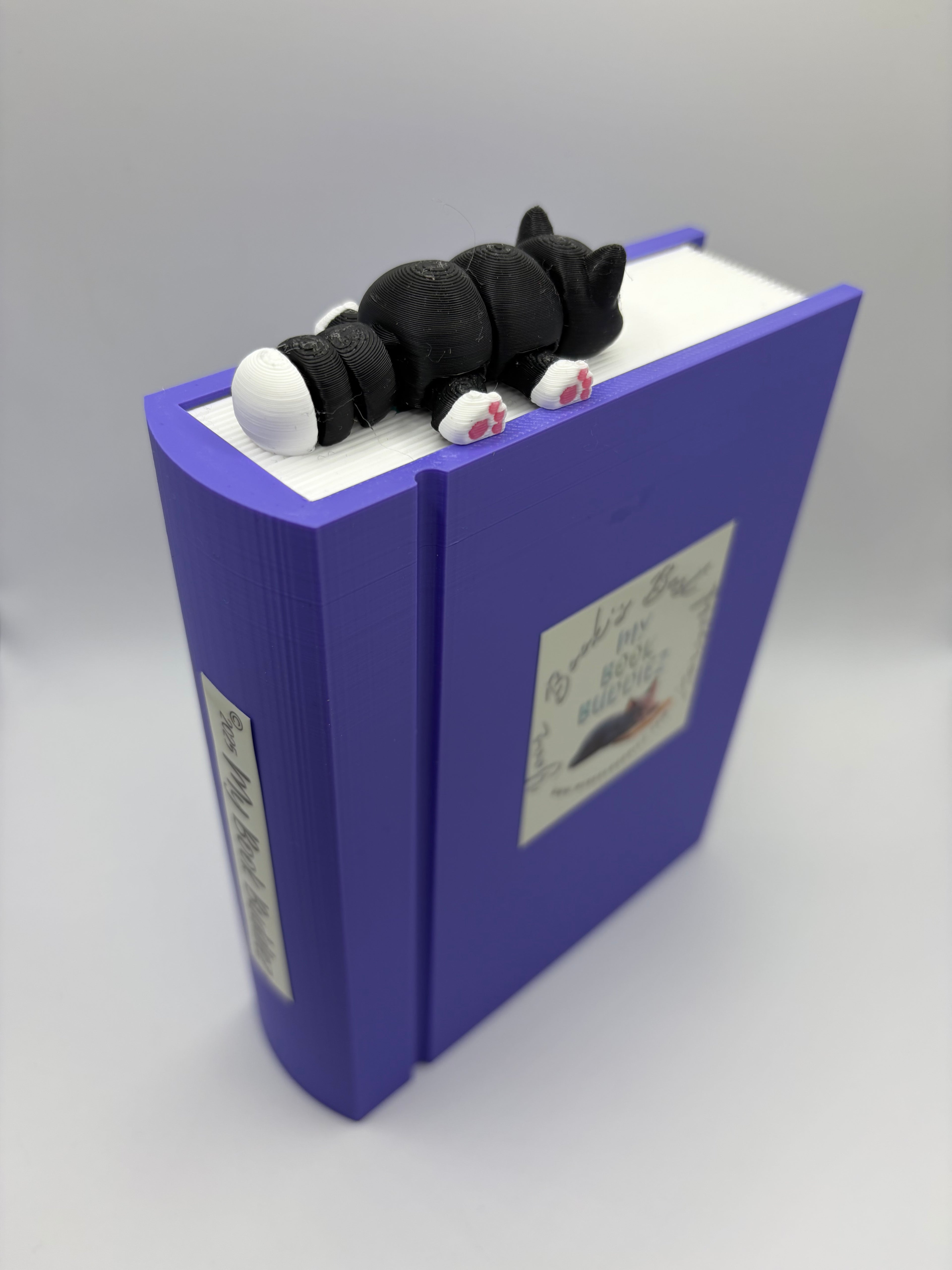 Curious cat articulated bookmark topper for cat lovers and book enthusiasts